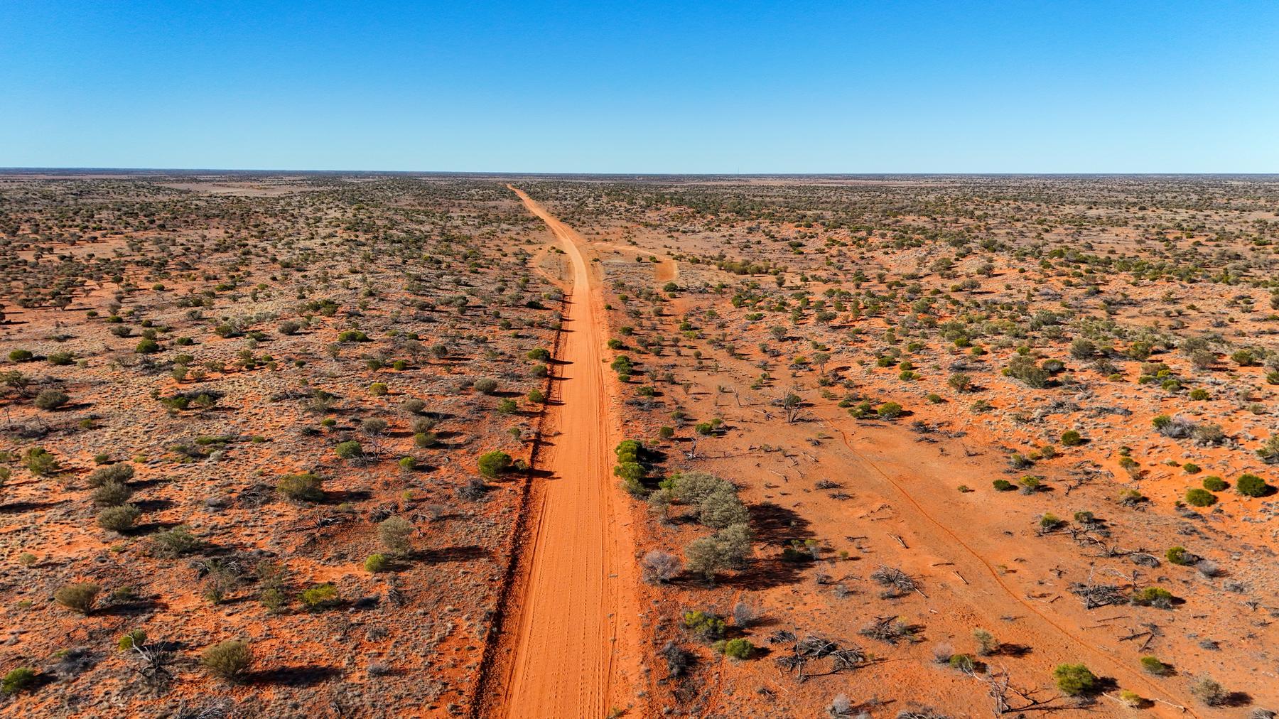 A red dirt road through the Australian outback, Native Title country.